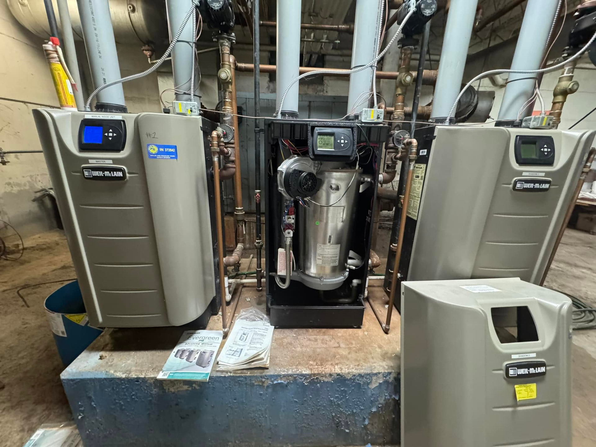 Weil-McLain commercial boiler bank serviced by 32 Heating and Cooling